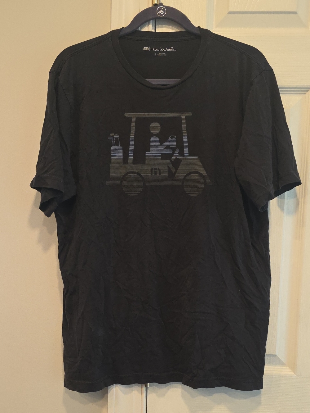 Travis Mathew Black Tee with Tonal Golf Cart Graphic